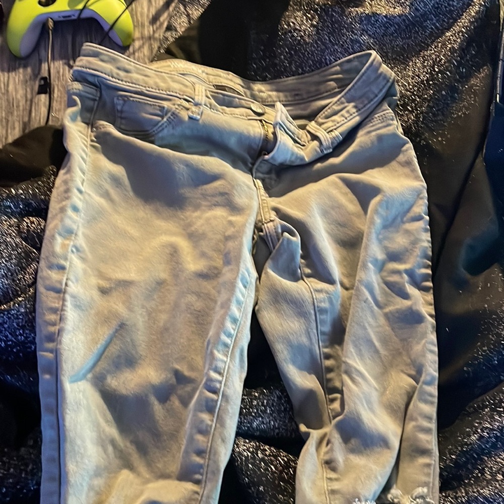 jeans green rips on knees rarely worn, mid rise super stretch